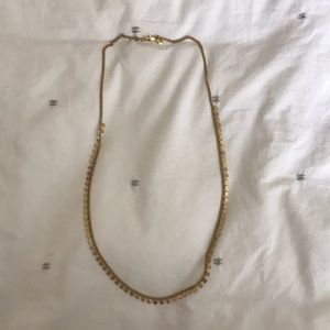 Long gold shape necklace